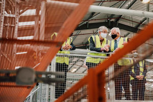 Mark Drakeford chats to Kronospan's Mike McKenna