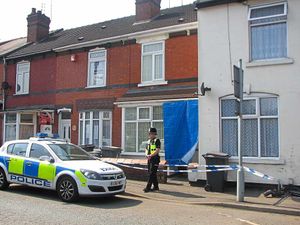 Police cordon off the Massaro house in Woden Road, Wolverhampton following the couple's murder