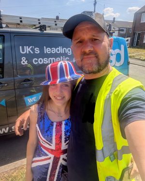 Stuart Field and his daughter Courtney Wright and her Union flag dress. 