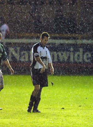 It never rains... Steve Palmer sums up the mood after defeat in the FA Cup replay, October 30, 2001.