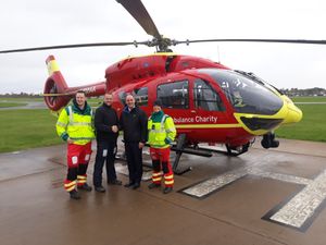Supporting image for story: Mission complete as £10k handed to air ambulance by Shropshire firm