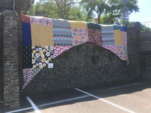 Patchwork panels of ‘Bridges, Not Walls' Llangollen Bridge artwork by artist Luke Jerram