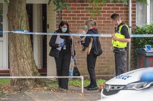 Police at the scene in Unett Street. Photo: SnapperSK