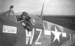 First Lieutenant John Fawcett smiles from the cockpit of his newly painted Spitfire dubbed Lady Ellen III. 