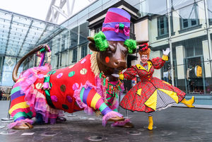 Panto Dame Andrew Ryan meets the Bull outside the Bullring in Birmingham City Centre.