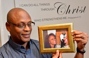 Errol Richards 54 (Works at RICOH in Telford, hence Shropshire Star too), he and work colleagues are fundraising for his daughter Anntoinette Richards to have experimental treatment to fight cancer. He holds a pic of her and of them together..