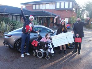 Supporting image for story: Ferrari dealers across the UK deliver toys to children’s charities