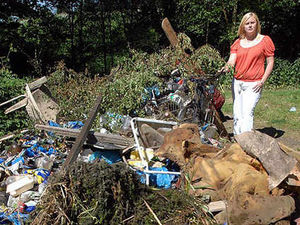 Supporting image for story: Fishing pool is dumping ground for fly-tippers