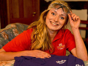 Supporting image for story: Post woman takes on shark dive for charity