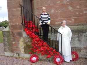 Supporting image for story: Cascading church poppies form tribute in Market Drayton