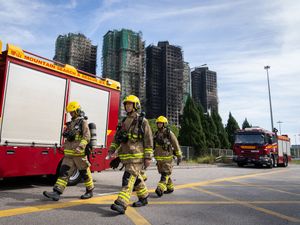 Supporting image for story: Hong Kong blaze death toll rises to 128