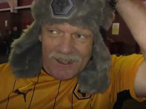 Supporting image for story: Wolves fans celebrate stunning FA Cup upset at Stoke