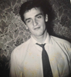 John pictured when he was a young man in his twenties