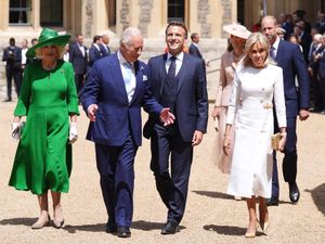 Supporting image for story: King and Queen roll out red carpet for the Macrons during French state visit
