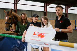 Lloyd Farm Arena is a new equestrian centre opening in Market Drayton and hosting a fundraiser this weekend. Pictured from left with Guinda the horse: Mike Yates, Maria Jones (Midlands Air Ambulance) and Nick Partridge