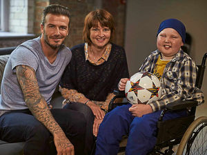 Supporting image for story: David Beckham makes Shrewsbury football fan Lloyd's day