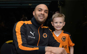 Carl Ikeme with a young fan