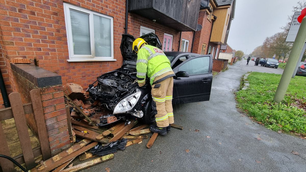 Man arrested after car crashed into north Shropshire home and caught on fire