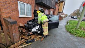 Emergency services were scrambled after a car crashed into a house in Gobowen and caught on fire. Photo: Oswestry Fire Station