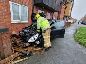 Supporting image for story: Firefighters seek hero woman who sprang into action after a car collided with Shropshire home and caught fire