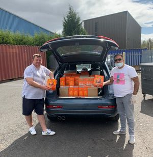 Members of Interfaith Council delivering food parcels