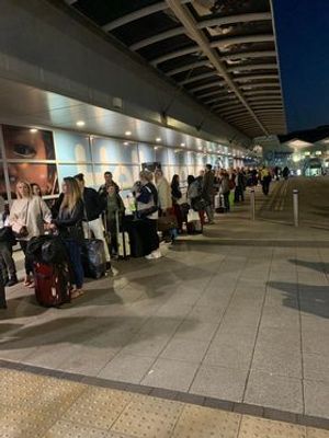Some say the queues are caused by people turning up too early for check-in. Photo: Ian Frances