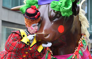 Panto Dame Andrew Ryan meets the Bull outside the Bullring in Birmingham City Centre.