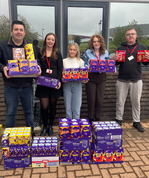 Telford MP Shaun Davies (left) with some of Telford & Wrekin Council’s Lived Experience Apprentices as he dropped off the Easter egg donations to Darby House.