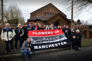 Manchester United fans at the church