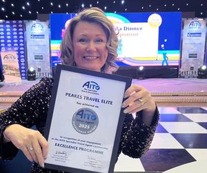 Claire Moore, MD at Peakes Travel Elite with the AITO award