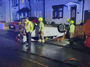 Supporting image for story: Car overturns near Dudley homes as heavy rain hits region