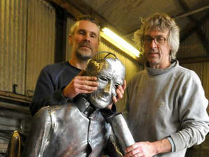 Supporting image for story: Cardinal Newman statue being stored in paint shop