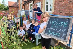 Weston Lullingfields CE Primary School is celebrating praise from SIAMS. Headteacher Kate Scott is pictured with pupils