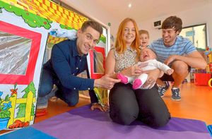 Simon Brodkin with Emma O'Callaghan, Indie Evans 3 months, Glenn Evans and Louie Evans 21 months, from Shrewsbury