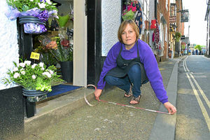 Supporting image for story: Florist ordered to remove blooms from Ludlow pavement