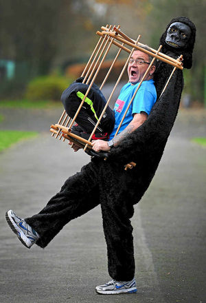 Glyn Marston shows off his gorilla costume