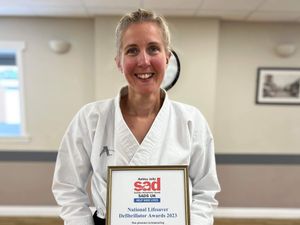 Supporting image for story: Lifesaving karate instructor who kick-started man's heart when he suffered cardiac arrest gets award