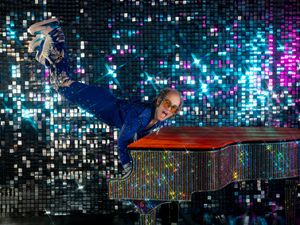 Supporting image for story: Elton John keyboard handstand waxwork unveiled at London’s Madame Tussauds