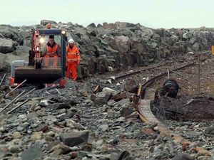 Supporting image for story: Flooding hits rail line