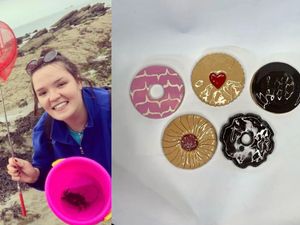 Composite image of woman and biscuit coasters