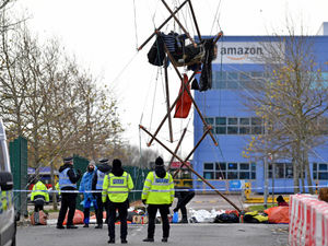 Supporting image for story: Extinction Rebellion protesters blockade Amazon Rugeley