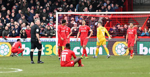 Players realise the dream is over as West Ham score.