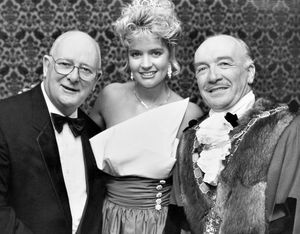 'Shropshire's own Miss United Kingdom, Suzanne Younger from St Martins, was a guest at Oswestry Borough Council's civil dinner on Saturday (April 24, 1989). Chief guest at the dinner was MP Denis Howell, left, who together with the Mayor Councillor Trevor Davies congratulated Suzanne on winning her United Kingdom title.'