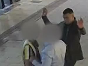 Supporting image for story: WATCH: Dancing thief strips Rolex watches from unsuspecting victims