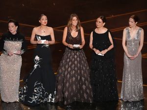 Supporting image for story: Bridesmaids cast reunite on Oscars stage and read out fake audience notes