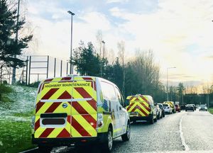 Vans of Telford and Wrekin Council's Neighbourhood Enforcement Officers outside Thomas Telford School.