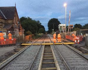 Network Rail workers on track at Onibury level crossing