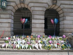 Flowers on the steps of Nottingham Council