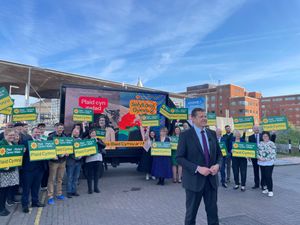 Rhun ap Iorwerth speaking at an event outside the Senedd to mark 12 months until the next Welsh elections.