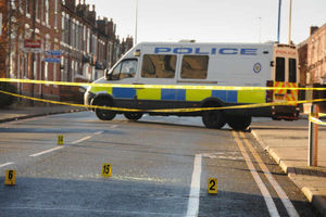 A police van in the middle of Dartmouth Street, which has been cordoned off
